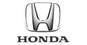 The image shows the Honda logo with a stylized silver H in a rounded rectangle above the word HONDA written in bold, uppercase letters.