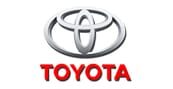 The Toyota logo consists of three overlapping ovals forming a stylized T above the word TOYOTA in bold red capital letters.